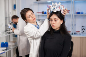 neurologist-moden-clinic-preparing-patient-headset-with-sensors-brain-scan-with-high-tech-technology-device-tomography-searching-diagnosis-ill-nervous-system